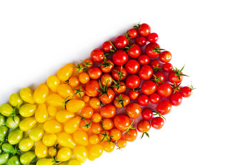 The harvest of tomatoes. Different color and varieties of tomatoes on a white background. Healthy...