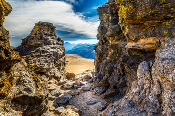 Fototapeta na wymiar View on the Rocky Mountain National Park through rocks on the Tundra Community trail, Colorado