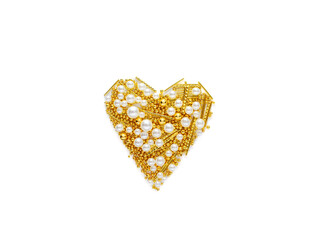 Luxury heart made of gold and pearls on a white isolated background. Valentine's day, love