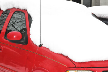 Snow on Red Car