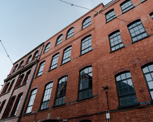 Red brick office building with large windows