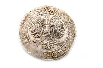 medieval european silver coin on white background