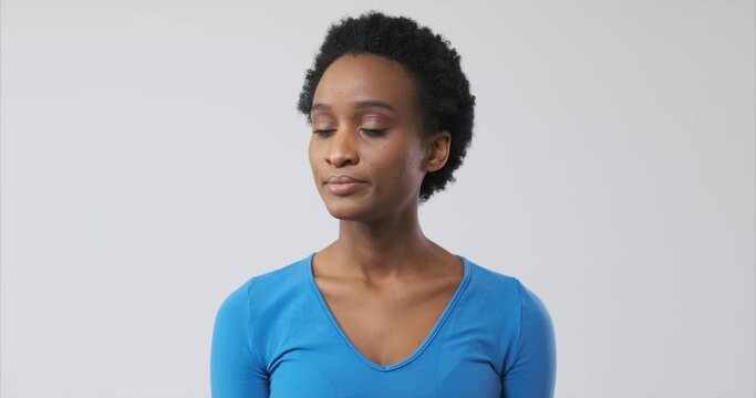 Disappointed african american woman regretting her deeds