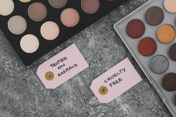 cruelty free vs animal tested cosmetics eyeshadow palettes with text on labels