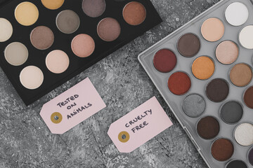 cruelty free vs animal tested cosmetics eyeshadow palettes with text on labels