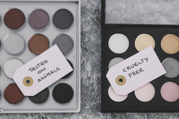 cruelty free vs animal tested cosmetics eyeshadow palettes with text on labels