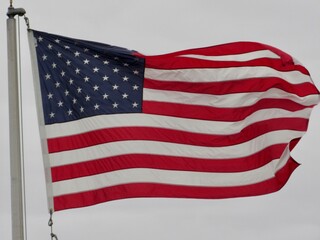 Fototapeta premium american flag waving in wind
