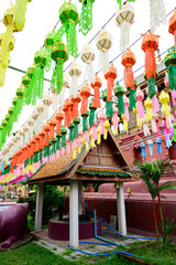 Colorful paper lanterns Lanna style hanging for worship or respect of buddha at Wat Phra That Hariphunchai, Lamphun. Lanterns festival in Loy Krathong or Yee Peng in northern of Thailand