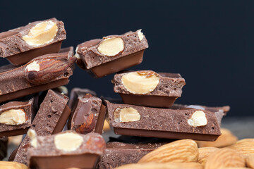 almonds and chocolate mixed in sweet chocolate