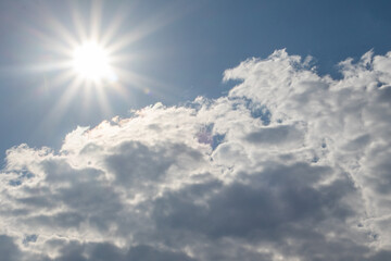 Naklejka na ściany i meble white and fluffy clouds on a sunny day
