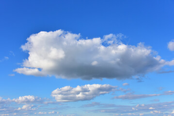 Large white clouds against the blue sky