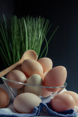 Fresh eggs in a glass bowl
