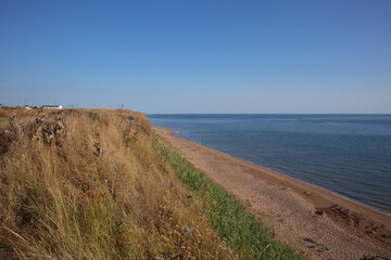 Beach on the coast of the sea of Azov. Kuchuguri