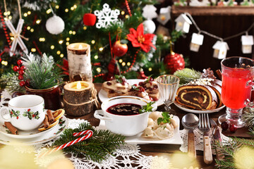 traditional in Poland Christmas Eve dishes on festive table