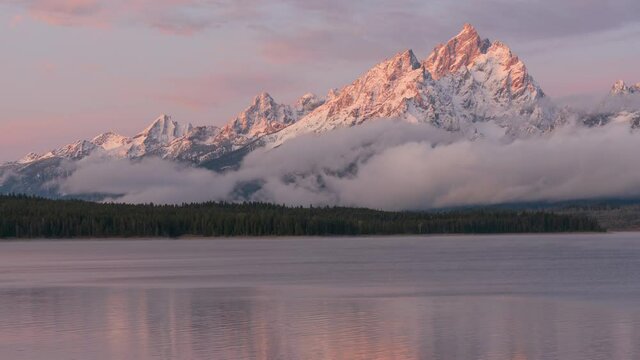 Timelapes of morning transition of light on Grand Teton and Jackson Lake in Wyoming's Grand Teton National Park. 