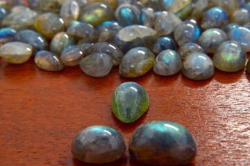 Beautiful and rare labradorite Lay on the ground