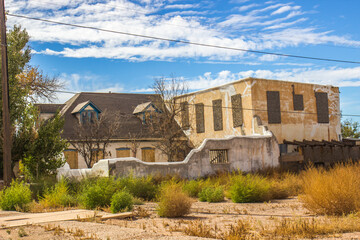 Fototapeta na wymiar Uninhabitable Abandoned Two Story Residential Buildings