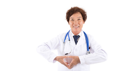 Fototapeta premium Female doctor in white coat in front of white background