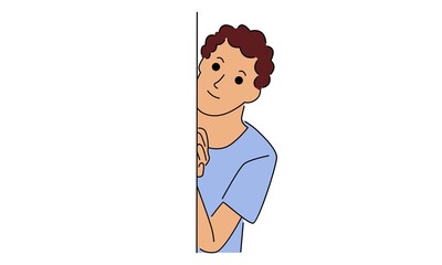 Boy hides behind the wall