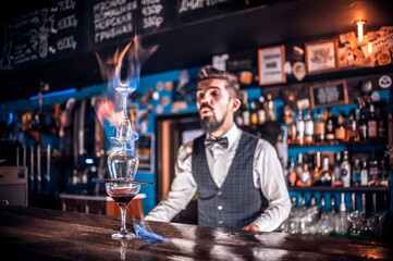 Barman creates a cocktail on the taproom