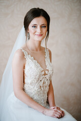 Perfect fashion model woman with beautiful hairstyle and make-up. Beautiful bride style. Wedding girl in luxury wedding dress.