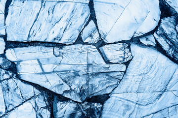 Blue cracked rock textured background