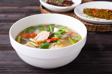 Thai Spicy chicken clear soup , tom yum kai,