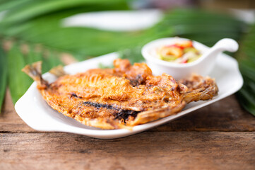 Deep fried Fish and green mango salad