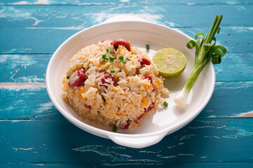 Asian Fried Jasmin rice with sausage and eggs.