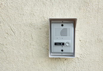 Close up intercom access control system setting on wall for smart home security system.