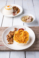 Fried Pork with Garlic, Pepper and fried egg on rice. Easy thai food.