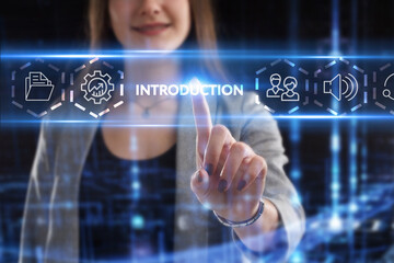 Business, Technology, Internet and network concept. Young businessman working on a virtual screen of the future and sees the inscription: Introduction