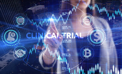 Business, Technology, Internet and network concept. Young businessman working on a virtual screen of the future and sees the inscription: Clinical trial