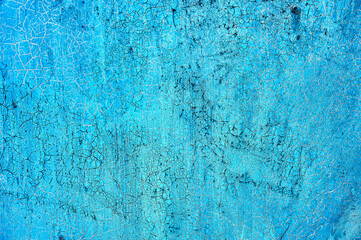 blue cracked paint on metal	
