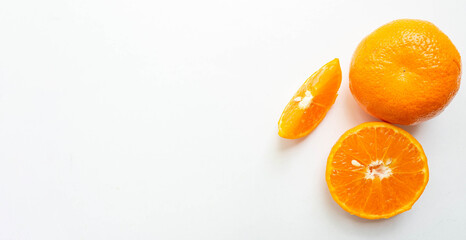 Orange fruits turned into full-size sets, half cubes, and halves. Show a fine pattern of orange skin Slices of orange pulp White background.Copy space
