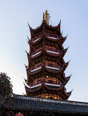 Symbolic octahedral Medicine Buddha Pagoda in ancient Jiming (Rooster Crowing) Temple, Nanjing, Jiangsu, China. Existing temple was condtructed in Ming dynasty. One of oldest ones in City.