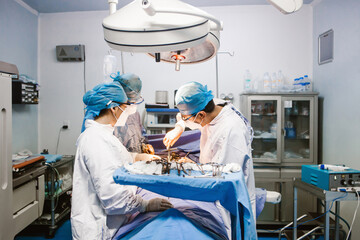 Surgery being performed in Mexican hospital by a team of doctors and nurse