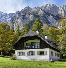 Fototapeta na wymiar Wooden house in the alpine village.