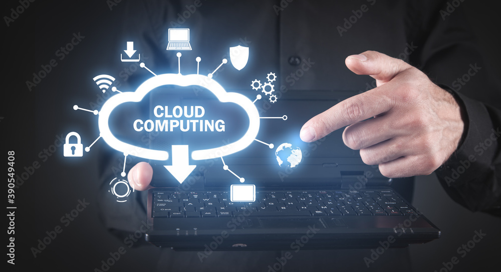 Wall mural man holding laptop computer. cloud computing