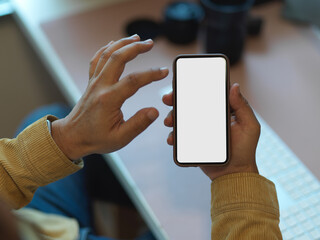Male office hands touching on smartphone screen, include clipping path