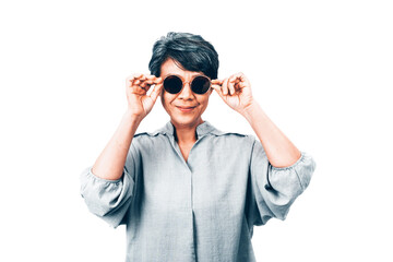 Active middle-aged Asian grey hair woman, Smiling with sunglasses over white background. Concepts about Positive seniority