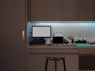 Office desk with digital tablet, computer, keyboard and supplies, clipping path