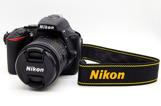 Bologna / Italy - November 11, 2020: Nikon D5600 isolated on white background. Studio shot.