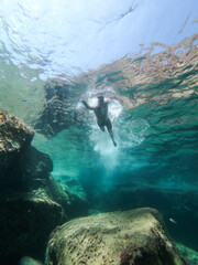 Man swimming in the sea.