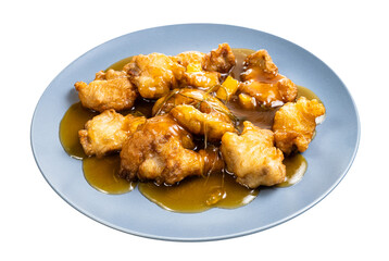 chinese cuisine - Pork in orange sauce (sliced pork tenderloin fried in batter with orange sauce and garnished with cilantro) on blue plate isolated on white background