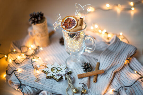 Christmas card with chrismas ligh. Soft focus. Cup with lights. Chrismas and New Year background. Flat lay