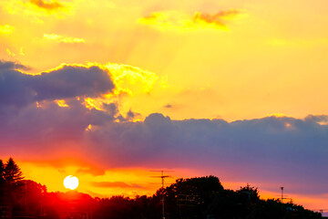 Fototapeta premium 【夕日イメージ】夕日に照らされた空