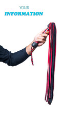Leather whip in male hand isolated on white background. Strict black and red whip in man's hand....