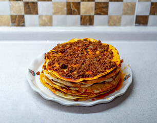 Traditional Turkish Food Kayseri Yalama with Minced Meat, Yogurt and Tomato Paste