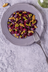 Beetroot, pesto sauce and walnut salad